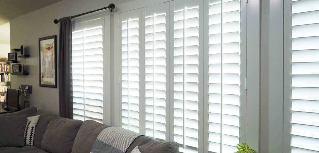 Close up of white polywood shutters